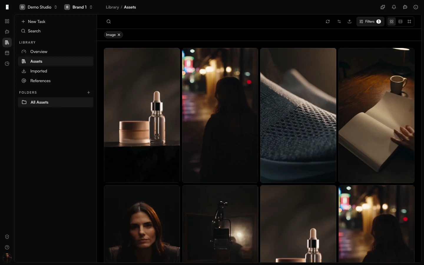 The Genfeed Library showing a grid of saved images and videos